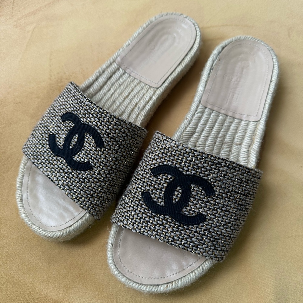 Chanel CC Black and Beige Women's Espadrille Slides with Gold Specs.